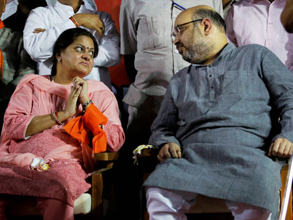 Newly elected BJP President Amit Shah with his wife