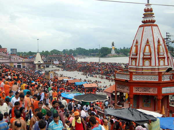 Kanwariyas taking holy dip and collecting holy Ganga 