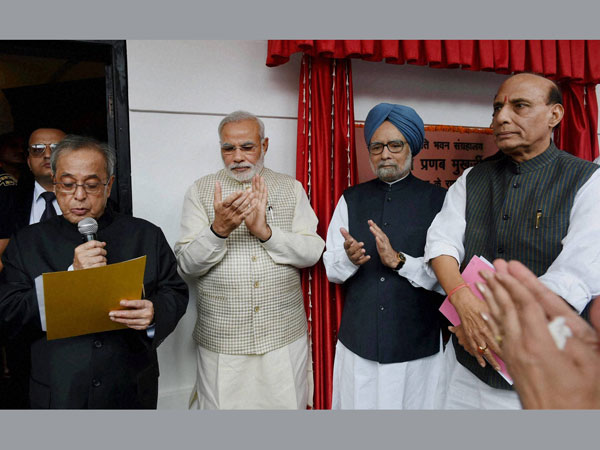 Presidents Pranab Mukherjee speaks as Prime Minister Narendra Modi