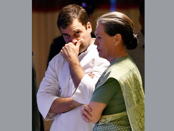 Congress President Sonia Gandhi with her son at an Iftar party