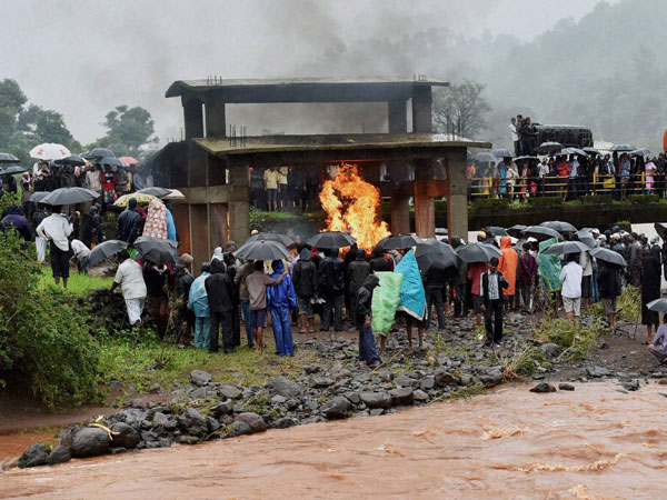 Mass funeral of the victims near the site of a landslide