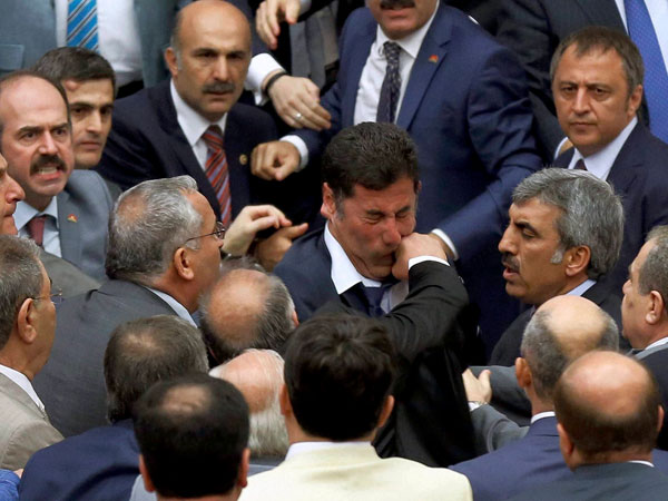 Caught on lens- MPs fist fighting