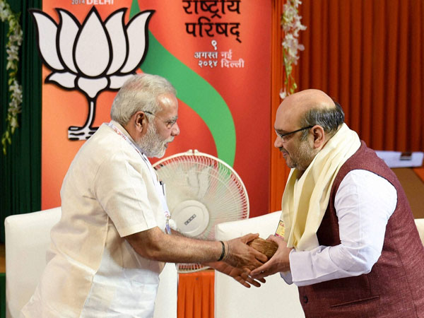Prime Minister Narendra Modi greets BJP President Amit Shah 