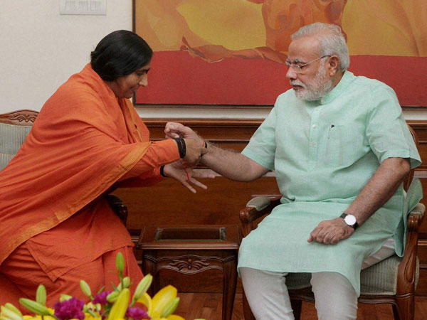 Sadhvi Rithambara tying ‘Rakhi' to Prime Minister Narendra Modi