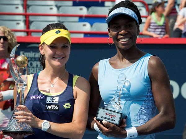 Victorious smile for the shutterbugs