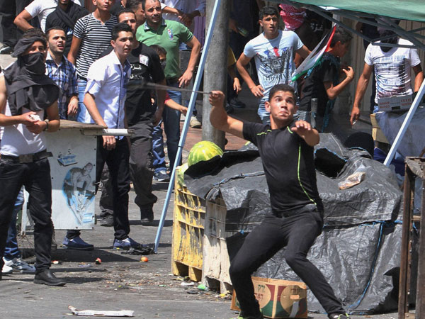 Palestinians protest against Israeli army