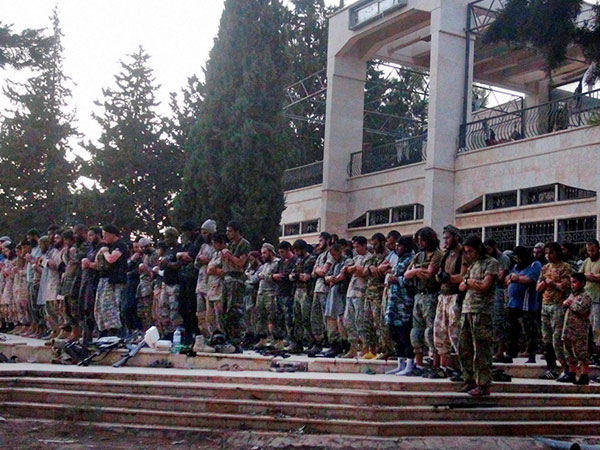 IS militants pray inside air base 