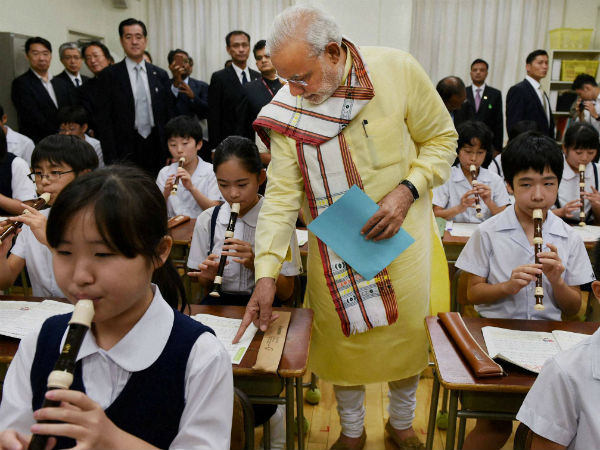 Narendra Modi with children in Japan