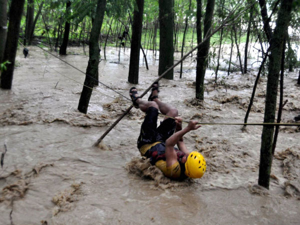 A youth attempts to move at safer place