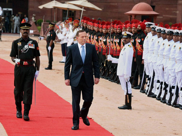 Australian Prime Minister Tony Abbott inspects guard of honour