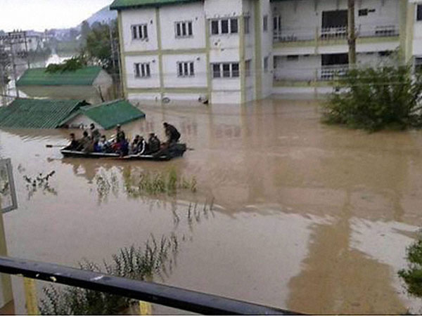 Army men at rescue work in a flooded locality