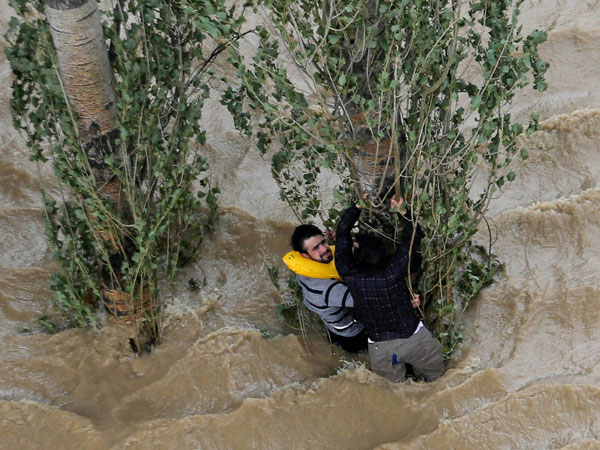 IAF soldiers carry out winching operation to rescue flood-affected people