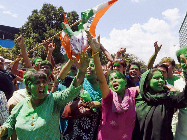 Trinamool Congress supporters celebrate their victory