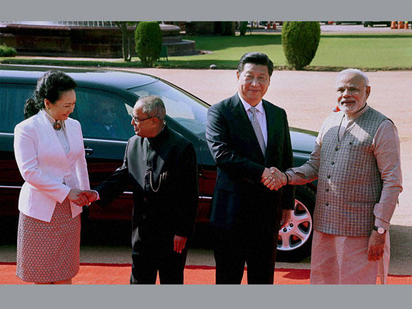 Prime Minister Narendra Modi shakes hand with Chinese President