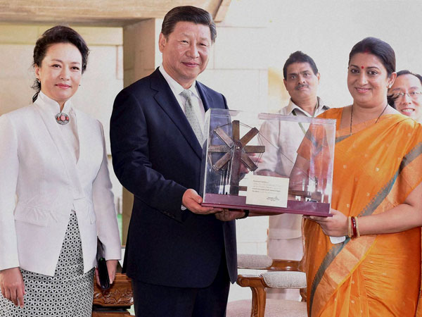 Human Resource Development Minister Smriti Irani presents a model