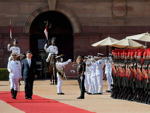 Chinese President Xi Jinping inspects a guard of honour 