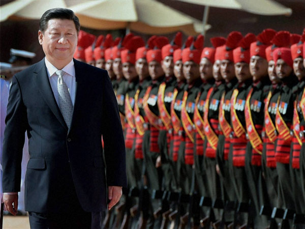 Chinese President Xi Jinping inspects a guard of honour 