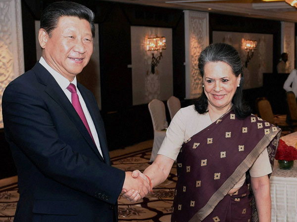 Congress President Sonia Gandhi greets Chinese President Xi Jinping