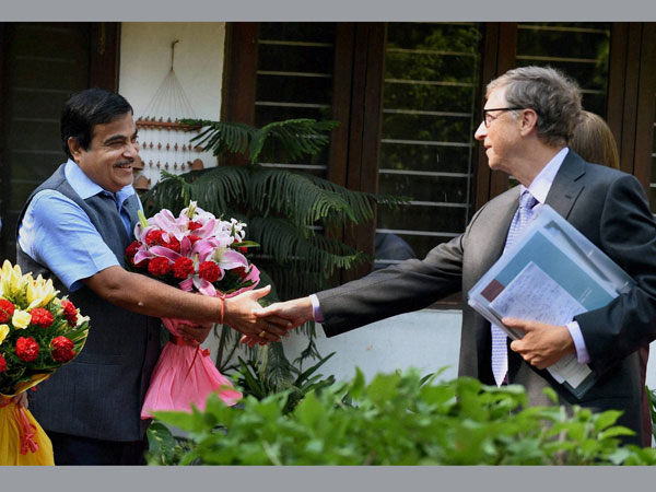 Union Transport Minister Nitin Gadkari shakes hands with Bill Gates