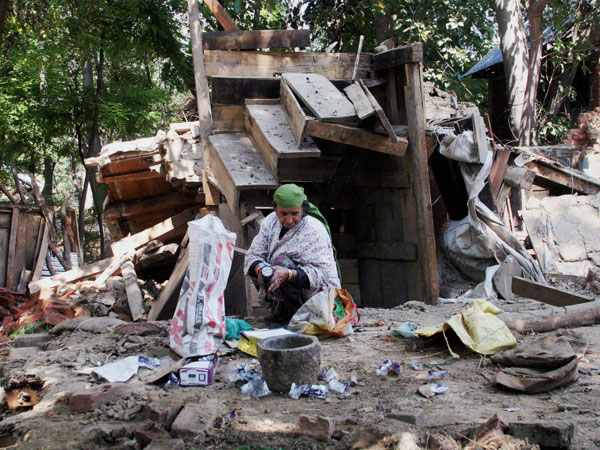 A woman hit by the Jammu and Kashmir floods