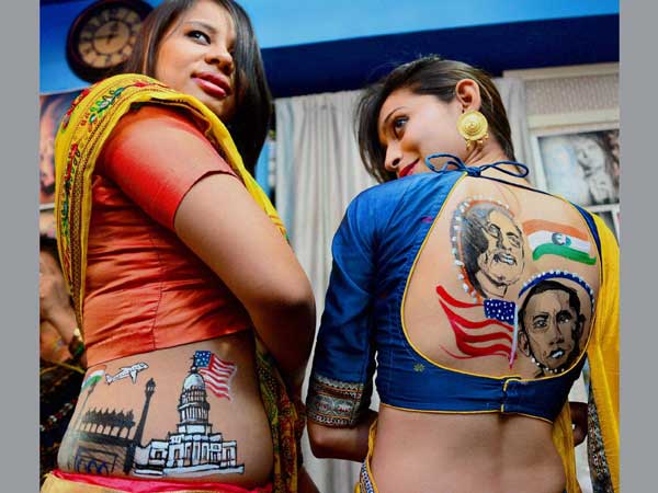 Girls showing their bodies painted with pictures