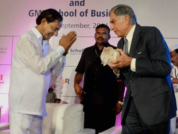 Telangana Chief Minister K Chandra Sekhar Rao presenting a memento to industrialist Ratan Tata