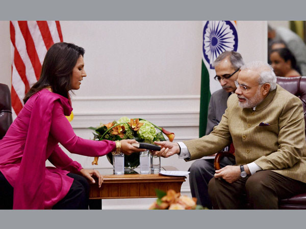 Prime Minister Narendra Modi recieves a gift
