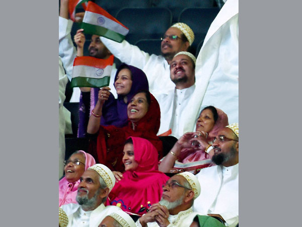Supporters cheer during a reception