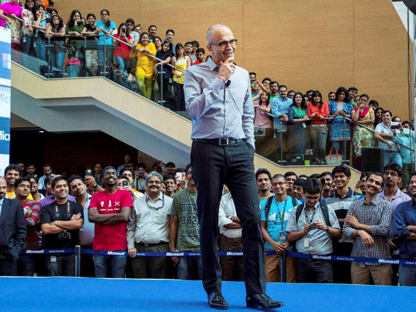 Microsoft CEO Satya Nadella interacts with the employees