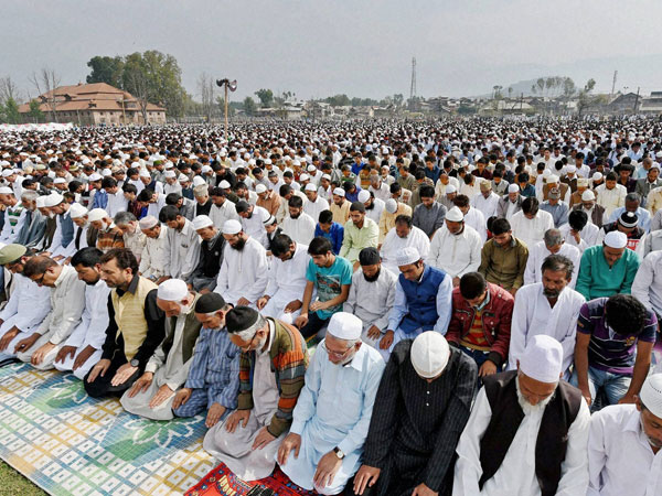 Kashmiri Muslims offer Eid prayers on the occasion
