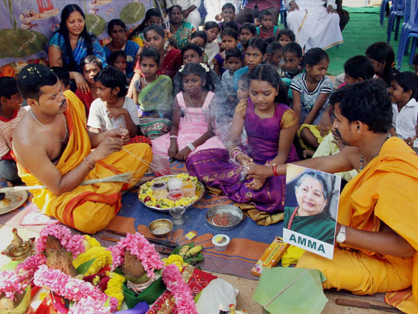 Supporters of AIADMK leader Jayalalithaa perform 'havan' to pray