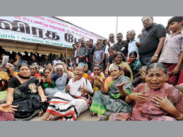 Supporters cry during a protest against AIADMK chief J Jayalalitha's conviction