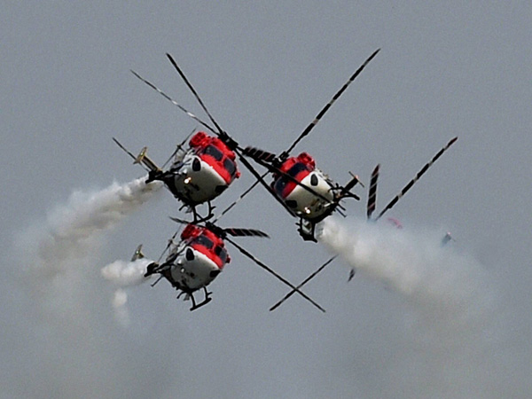 Sarang helicopters fly in a formation Sarang helicopters fly in a formation
