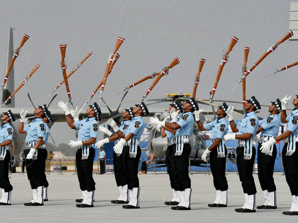 IAF personnel perform with their guns IAF personnel perform with their guns