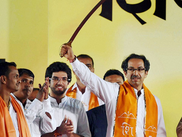 Shiv Sena President Uddhav Thackeray displays a sword 