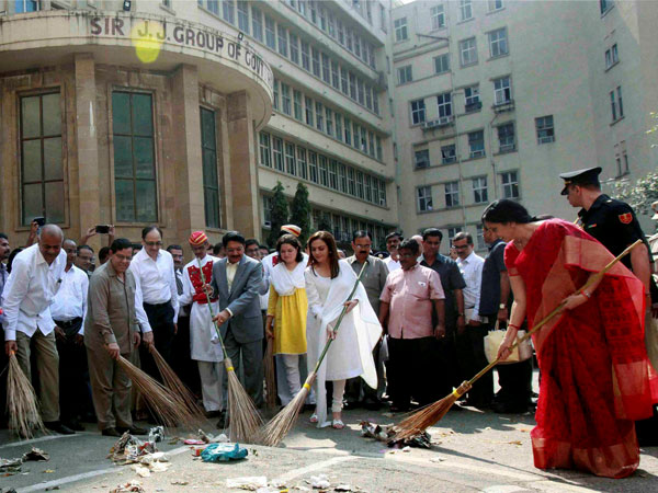Sweeping dirt off Mumbai