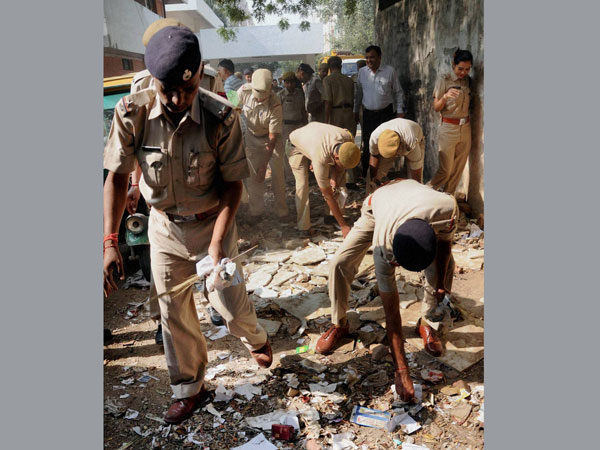 Police personnel during a cleanliness drive