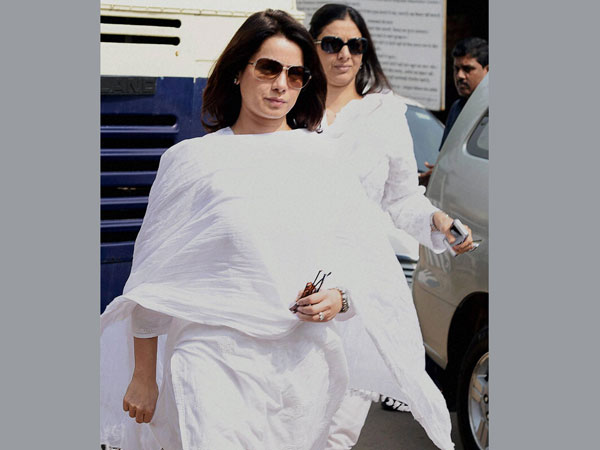 Film actress Neelam and Tabu arrive to appear in a court