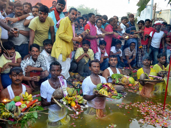 Prisoners offer prayers during Chhath Puja