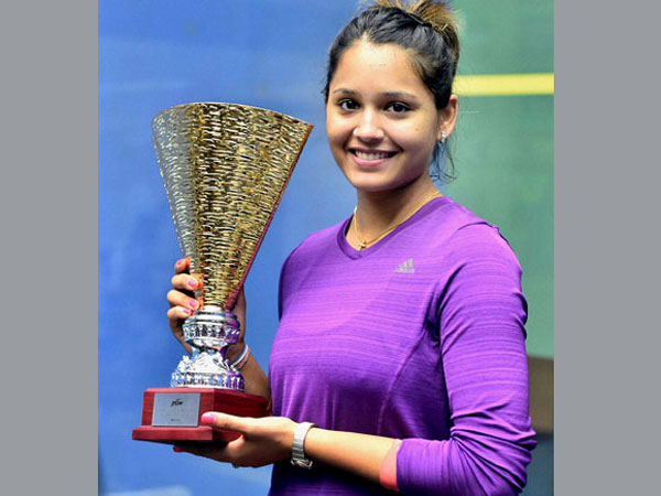Indian Squash player Dipika Pallikal poses with the trophy 