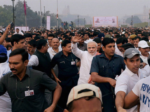 Prime Minister Narendra Modi waves during the 'Run for Unity' 