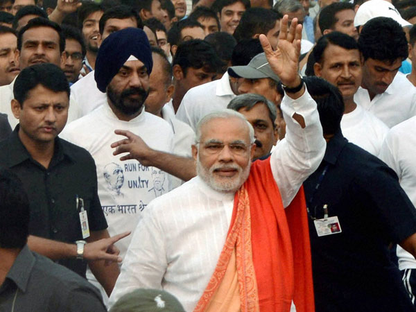 Prime Minister Narendra Modi waves during the 'Run for Unity' 