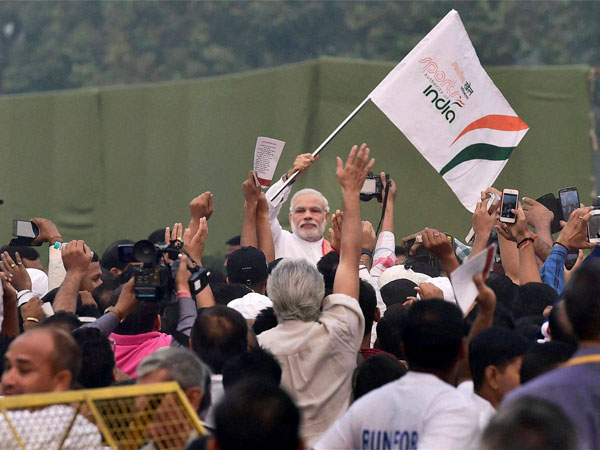Prime Minister Narendra Modi waves during the 'Run for Unity'