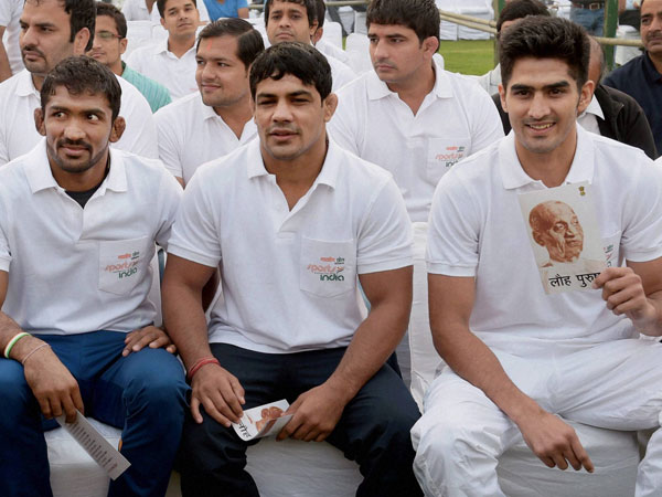 Sportspersons Vijender, Sushil Kumar and Yogeshwar Dutt during the 'Run for Unity' 
