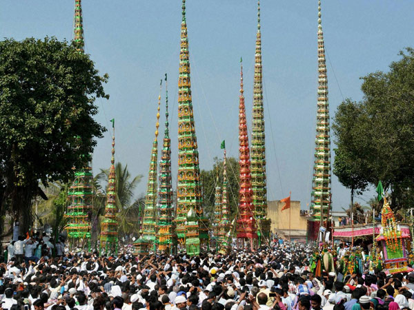 Muslims carry Taziyas during a Muharram procession