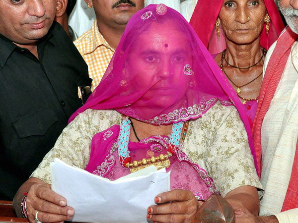 A woman filing her nomination as a BJP candidate