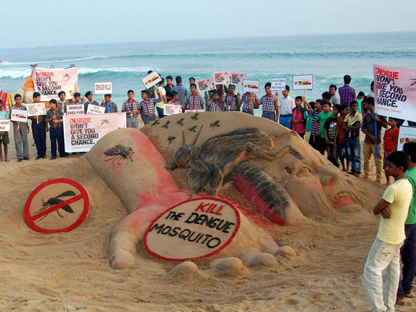 Sand artist Sudarsan Pattnaik creates a sand sculpture