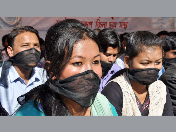 Protesters set a truck on fire in protest of Assam violence Protesters set a truck on fire in protest of Assam violence