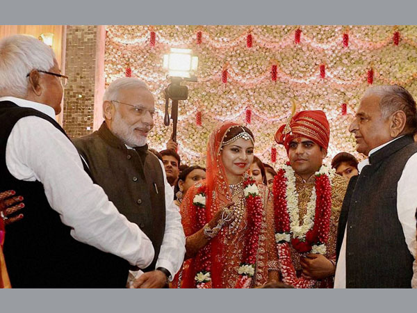 When PM Modi shook hands with Nitish Kumar: A rare photo op at wedding reception of Lalu's daughter. When PM Modi shook hands with Nitish Kumar: A rare photo op at wedding reception of Lalu's daughter.