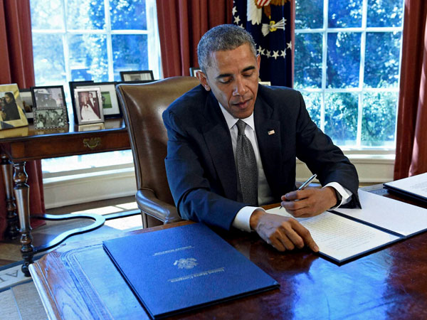 Obama signs a Memorandum of Disapproval Regarding S.J. Res. 8